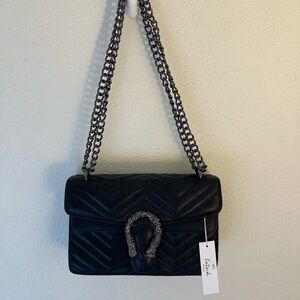 Black purse from a local boutique! NWT.